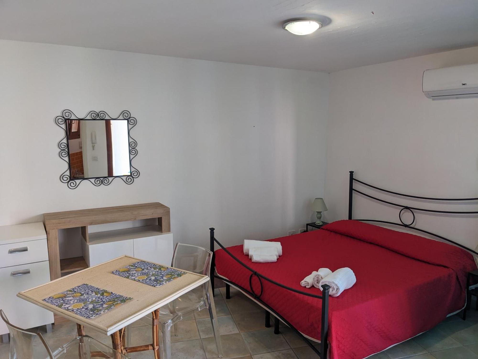 Aparthotel Residenze Il Girasole Golfo Aranci Camera foto